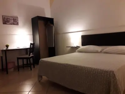 Letto o letti in una camera di Fontanarossa Airport Home