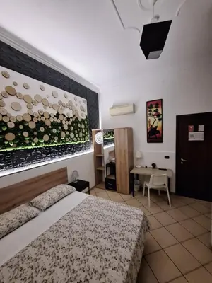 Letto o letti in una camera di Fontanarossa Airport Home
