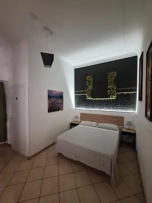 Letto o letti in una camera di Fontanarossa Airport Home