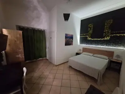 Letto o letti in una camera di Fontanarossa Airport Home