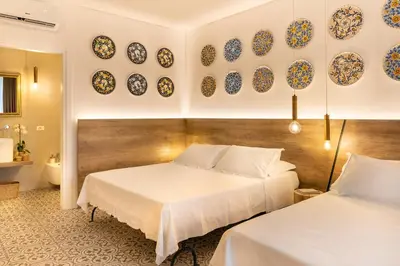 Letto o letti in una camera di Filinona B&B