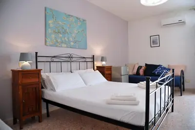 Letto o letti in una camera di Casa Taro