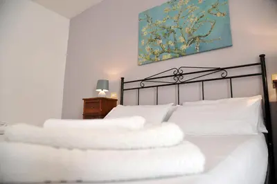 Letto o letti in una camera di Casa Taro