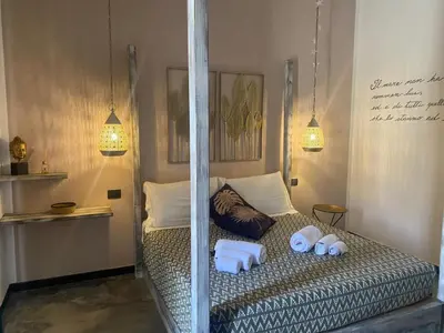 Letto o letti in una camera di Isola dei poeti