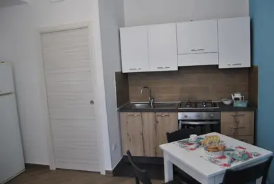 Cucina o angolo cottura di La Triade affittacamere