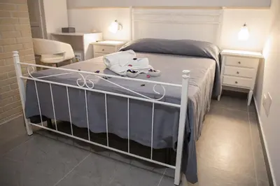 Letto o letti in una camera di Chibao