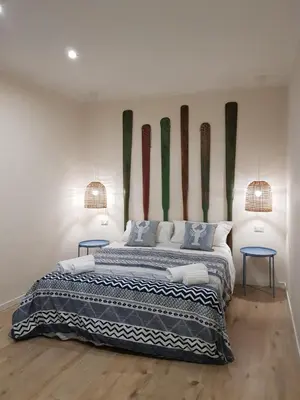 Letto o letti in una camera di B&B Gisira