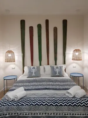 Letto o letti in una camera di B&B Gisira