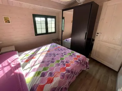 Letto o letti in una camera di Casetta Arùci Marzamemi Holidays