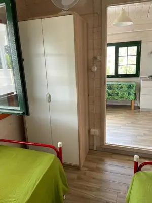 Letto o letti in una camera di Casetta Arùci Marzamemi Holidays