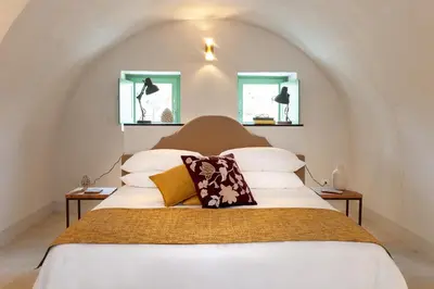 Letto o letti in una camera di Relais Terre di Romanello