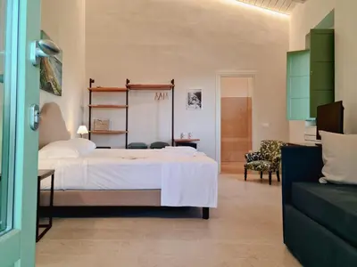 Letto o letti in una camera di Relais Terre di Romanello