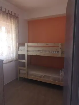 Letto o letti in una camera di Villa Magie del Mare
