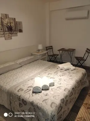Letto o letti in una camera di La Fenice