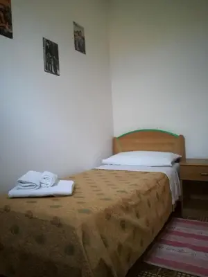 Letto o letti in una camera di La Fenice