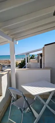 Balcone o terrazza di Casa La Rosa - Residence Rada delle Tortore