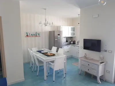 Cucina o angolo cottura di Casa La Rosa - Residence Rada delle Tortore