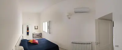 Letto o letti in una camera di Casa Euribia