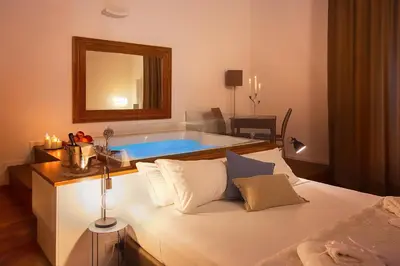Letto o letti in una camera di Naca Suite