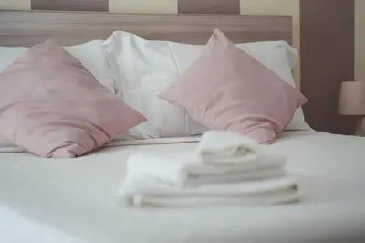Letto o letti in una camera di AMURI CASA VACANZE
