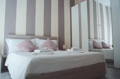 Letto o letti in una camera di AMURI CASA VACANZE