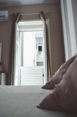 Letto o letti in una camera di AMURI CASA VACANZE