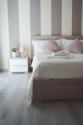 Letto o letti in una camera di AMURI CASA VACANZE