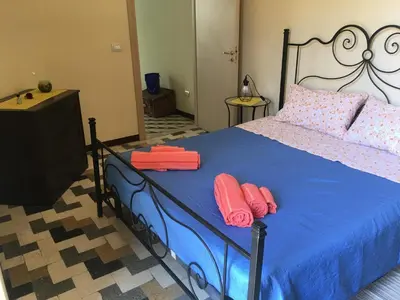 Letto o letti in una camera di Casa Gaetano