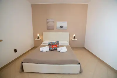 Letto o letti in una camera di b&b Zio Luciano