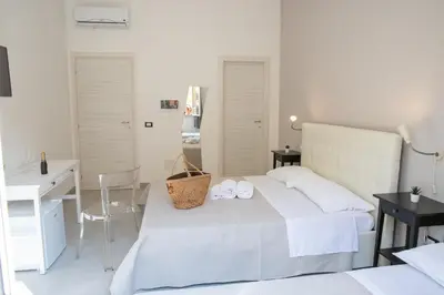 Letto o letti in una camera di b&b Zio Luciano