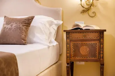 Letto o letti in una camera di Saint George's House Appartamenti & Spa