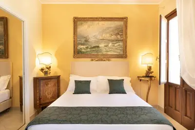 Letto o letti in una camera di Saint George's House Appartamenti & Spa