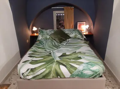 Letto o letti in una camera di Casa Famoso