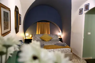 Letto o letti in una camera di Casa Famoso