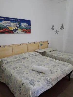Letto o letti in una camera di Casa Mariagrazia
