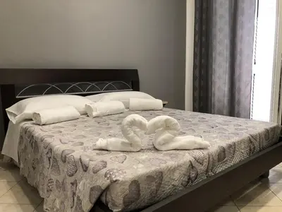 Letto o letti in una camera di B&B Azzurra