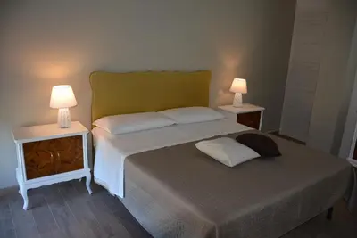 Letto o letti in una camera di CASA NANU - locazione turistica Pachino - Marzamemi -