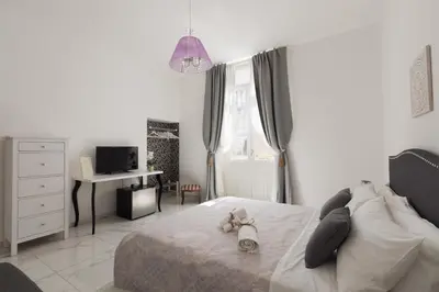 Letto o letti in una camera di Calafatari B&B