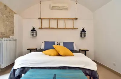 Letto o letti in una camera di Casa Vasa