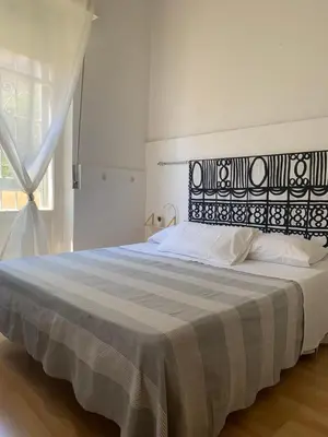 Letto o letti in una camera di B&B Giallolumia