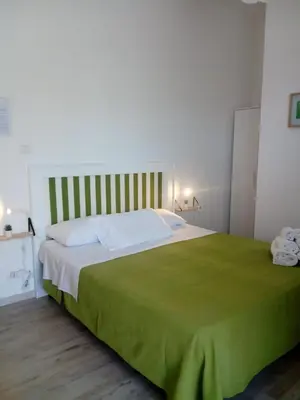 Letto o letti in una camera di B&B Giallolumia