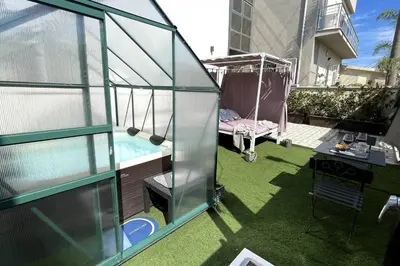Balcone o terrazza di Studio Alpha - relax e jacuzzi