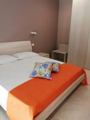 Letto o letti in una camera di Casa Bandiera