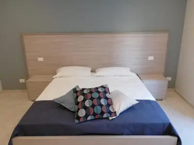 Letto o letti in una camera di Casa Bandiera