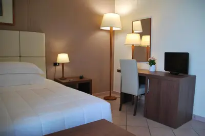 Letto o letti in una camera di Domus Mariae Albergo