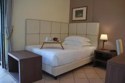 Letto o letti in una camera di Domus Mariae Albergo