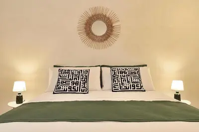Letto o letti in una camera di La casa dei Limoni con piscina Noto