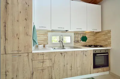 Cucina o angolo cottura di La casa dei Limoni con piscina Noto