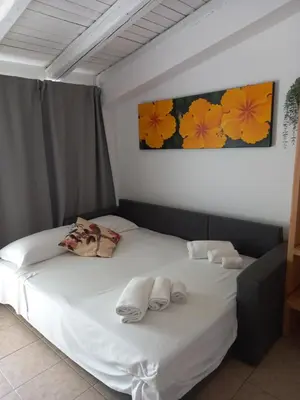 Letto o letti in una camera di Aloha Marzamemi Rooms