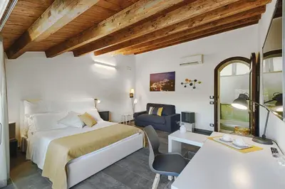 Letto o letti in una camera di Centosedici Rooms